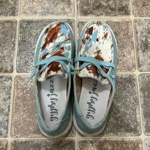 Gypsy Jazz Cow Print slip-on shoes